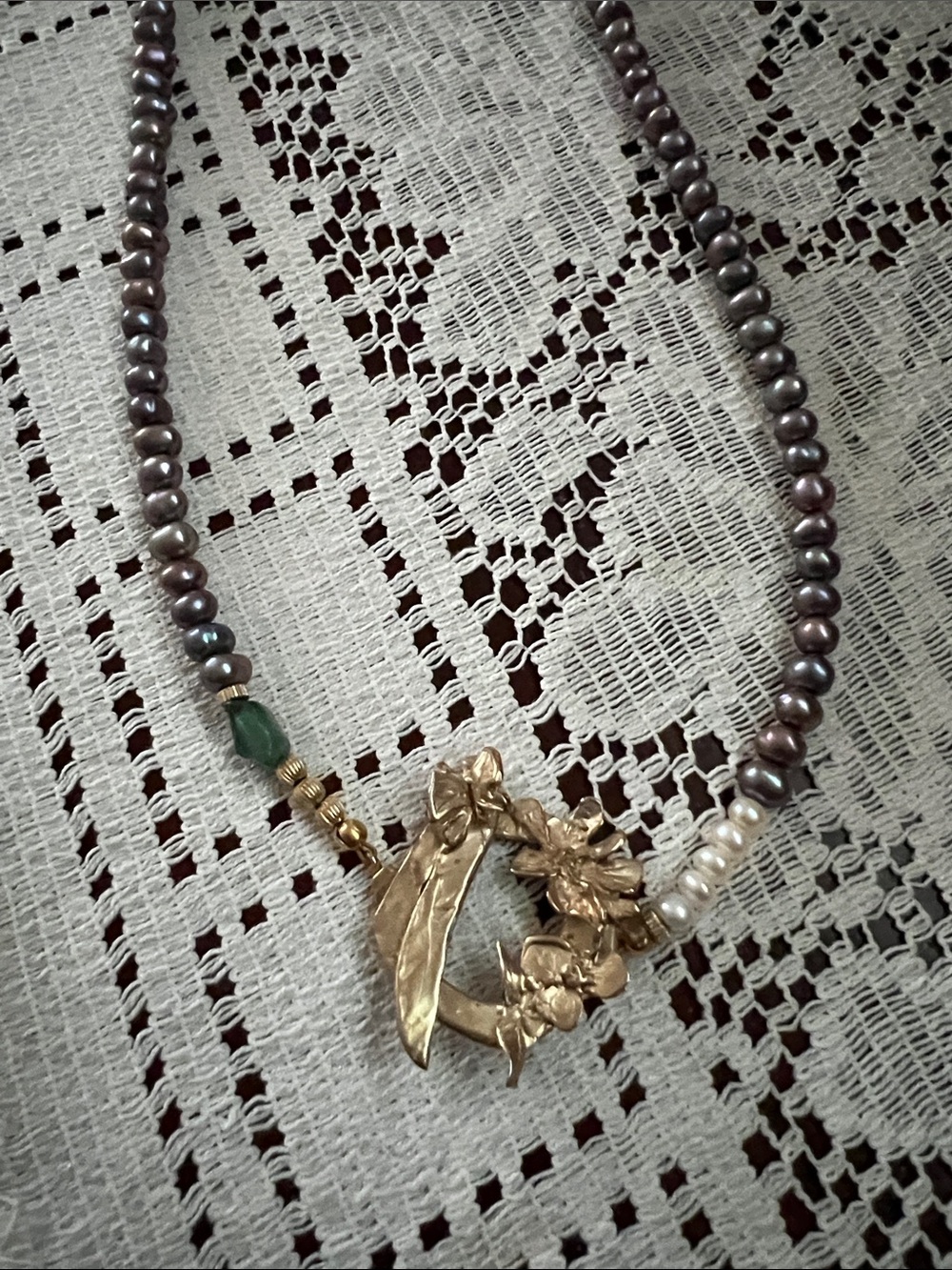 Handcrafted Purple Pearl Necklace with Gold Floral Pendant